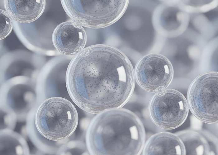 Microscopic view of silica sand grains showing their crystalline structure.