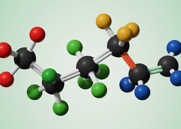 Illustration showing steric strain in a molecule due to bulky groups causing spatial hindrance and increased energy.