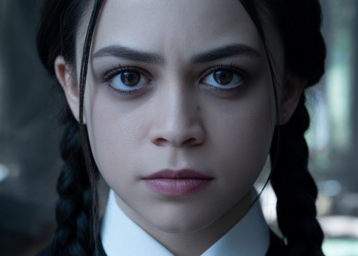 Close-up of Jenna Ortega as Wednesday Addams highlighting her dark eyes.
